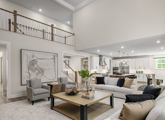 Modern open-concept NV Homes living room and kitchen with high ceilings